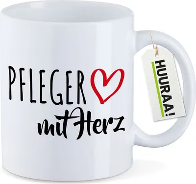 Produktbild von Huuraa Kaffeetasse Pfleger mit Herz 330ml Weiß Keramik Kaffeebecher Geschenkidee