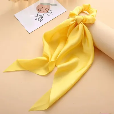 Immagine prodotto di Foulard lungo in raso elasticizzato con doppio fiocco giallo