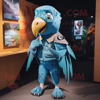 Produktbild von Cyan-Papagei REDBROKOLY Maskottchen kostüm gekleidet in Röhrenjeans und Anstecknadeln