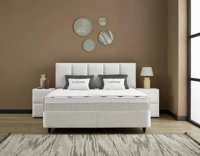 Produktbild von Boxspringbett Lucas 180 x 200 cm 2 Nachtkonsolen Cremeweiß Voll-orthopädisches Komfortbett mit Bettkasten, inkl. Lieferung und Montage