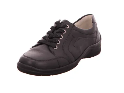 A single black women's sneaker is shown against a white background.