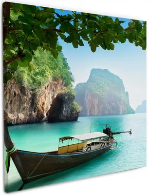 Produktbild von Wallario Premium Leinwandbild Fischerboot in Thailand  blaues Meer und Steinfelsen in Größe 50 x 50 cm