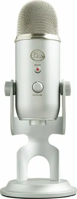 A silver Blue Yeti microphone on a white background.