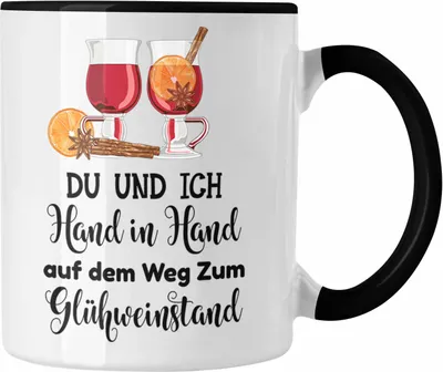 Produktbild von Trendation - Glühwein Tasse Lustig Spruch Glühweinbecher mit Henkel Doppelwandig Glühweintassen Gläser Weihnachtsmarkt Becher Tassen Geschenk - Hand In Hand Zum Glühweinstand (Schwarz)
