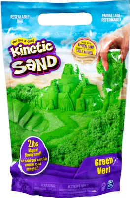 A bag of green kinetic sand with a castle built from the sand on the front.