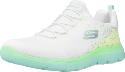 A white athletic shoe with green and yellow accents.