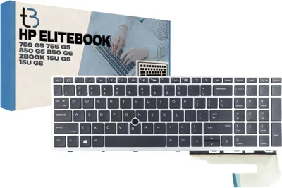 A laptop keyboard and its packaging are displayed.