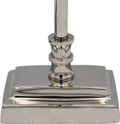 Close-up of the base of a silver lamp.