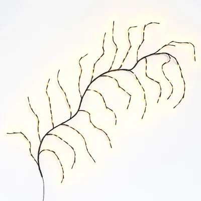 A decorative branch with LED lights against a white background.