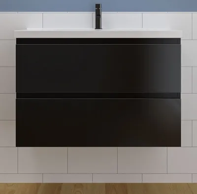 A black vanity with a white countertop and sink, set against a white tiled wall and a blue wall above.