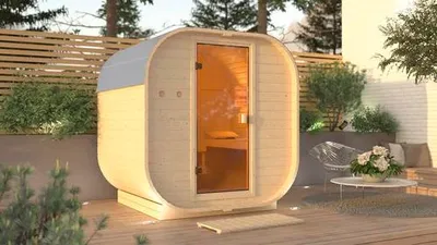 Produktbild von Fasssauna Karibu Quadrado 1 B:199 cm inkl. 9 kW  Ofen und externer Steuerung mit bronzierter Ganzglastüre