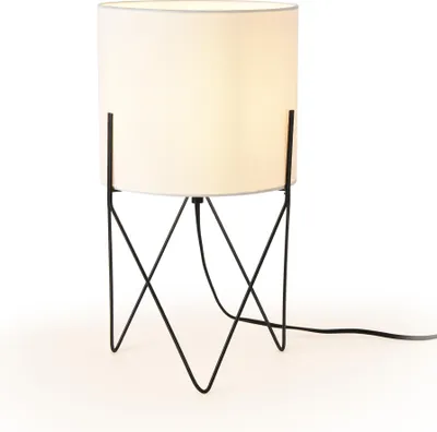 A white cylinder lamp with a black metal stand on a white background.
