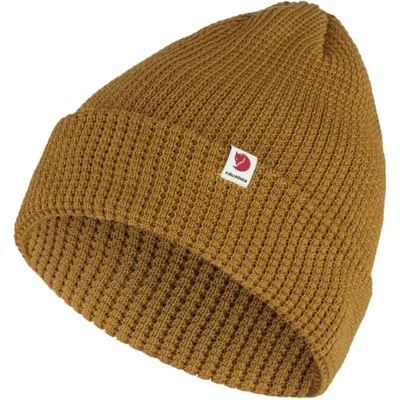 A single brown knitted beanie hat is shown against a white background.