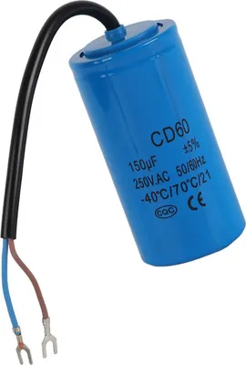 A blue capacitor with wires attached, isolated on a white background.
