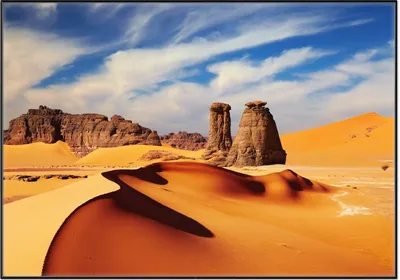 Produktbild von Wallario Wandbild Felsen und Sand in der Sahara Wüste, Größe: 70,30 x 100,30 cm, Poster mit schwarzem Aluminiumrahmen