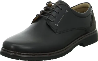 A single black leather shoe is shown from a side-angle on a white background.