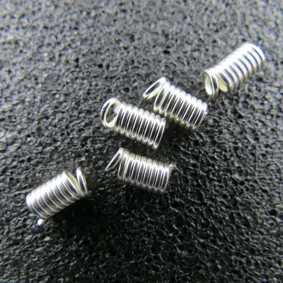 Image de ressorts métalliques 4 x 9 mm (avec une boucle)