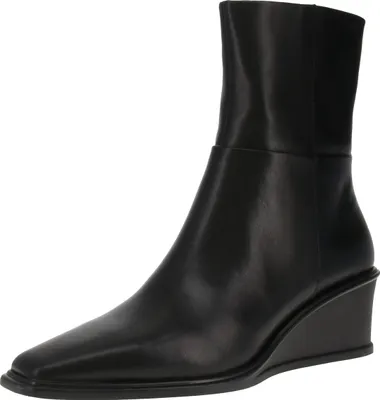 A studio shot of a single black boot.