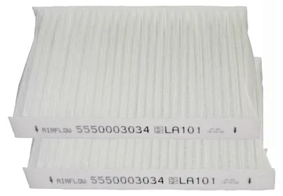 Two white pleated air filters are stacked on top of each other.