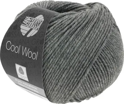 A ball of grey yarn with a label.