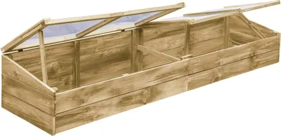 A wooden cold frame with transparent lids.