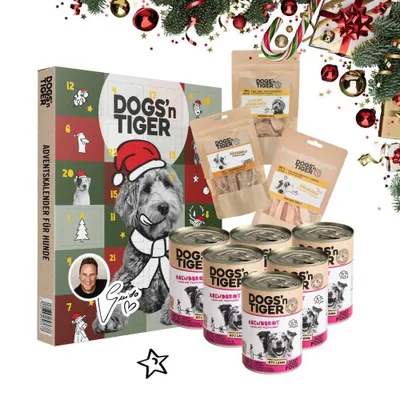 A collection of dog advent calendars, treats, and canned food arranged for a festive promotion.