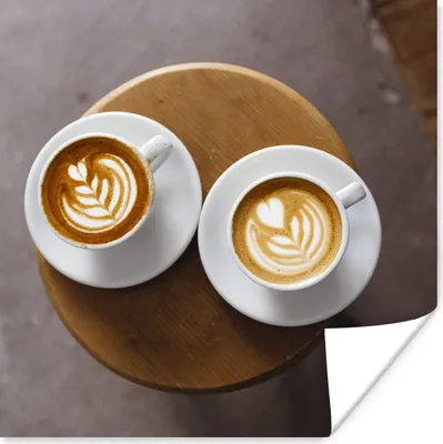 Produktbild von MuchoWow® Poster Zwei Kaffeetassen mit Latte Art werden von oben gezeigt 75x75 cm - Wand Dekoration