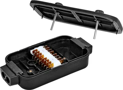 A black electrical distribution box with its lid open, showing internal connectors, is displayed against a white background.