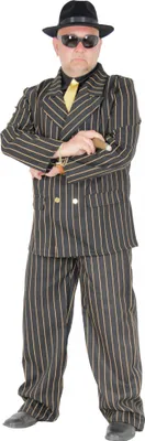 A man dressed in a pinstripe suit, hat, and sunglasses, holding a cigar.