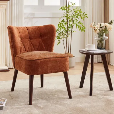 Immagine prodotto di Poltrona in stile metà secolo, rivestita in velluto, con schienale a forma di ala e gambe in legno, ideale per il soggiorno