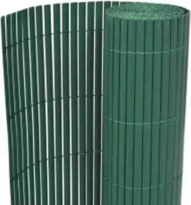 A rolled-up green fence and a partially unrolled section of the same fence.