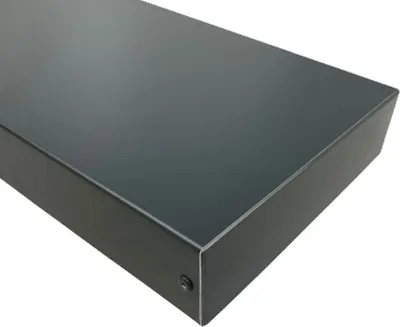 A close-up, angled view of a dark gray metal corner piece of a product, likely an end cap or cover.