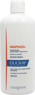 A white bottle of Ducray Anaphase+ shampoo for hair loss.