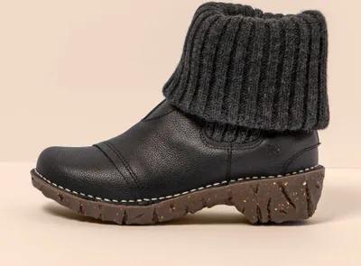 A single black boot with a gray knitted cuff is shown against a light gray background.