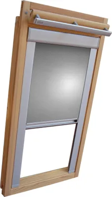A close-up view of a wooden framed skylight window with a silver-gray roller blind partially lowered.