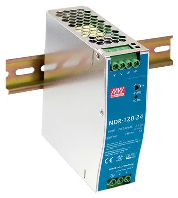 A DIN rail power supply unit mounted on a metal rail.