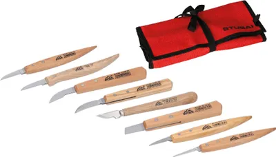 A set of carving knives and a red carrying case are laid out on a white background.