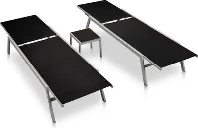 Two black sun loungers and a small black table are arranged on a white background.