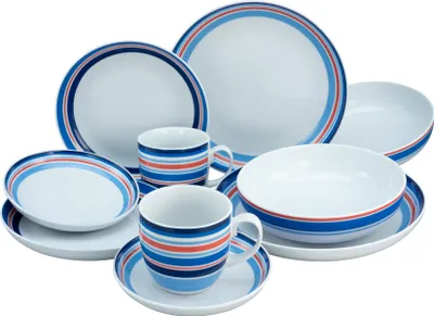 A collection of white ceramic dinnerware with blue, red, and orange stripes.