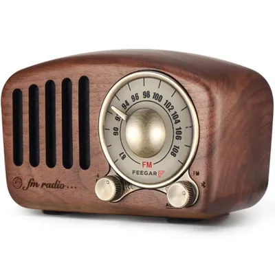 A vintage-style radio with a wooden casing and a classic dial.
