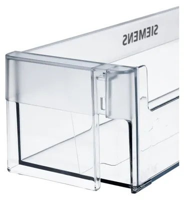 A close-up, clear shot of a transparent plastic refrigerator drawer or compartment.