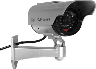 A silver dummy security camera with a black housing and lens, mounted on a silver bracket.