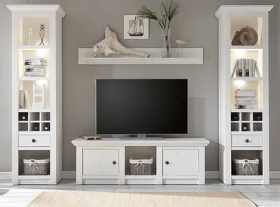 A white modular living room furniture set with a TV stand and two display cabinets.