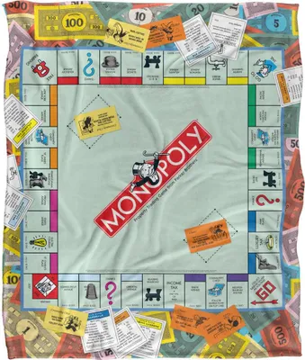 A Monopoly board game scene depicted on a blanket, with money and game cards scattered around.