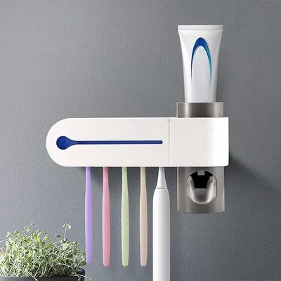 Produktbild von Famanu Zahnbürstenhalter mit UV-Sterilisator - Automatischer Zahnpastaspender, USB-betrieben, für 5 Zahnbürsten