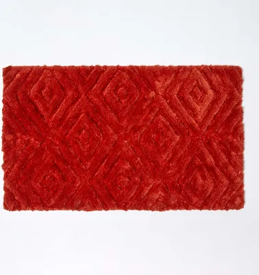 Produktbild von HOMESCAPES Ikat Rutschfeste Hochflor Badematte 100% Baumwolle, orange