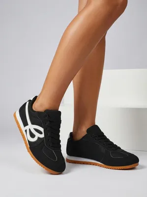 Produktbild von Schwarze Damen-Sneaker mit weißen Akzenten, Größe 40
