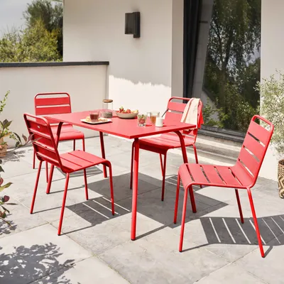 Image de Ensemble table de jardin en métal et 4 chaises rouge - Oviala Palavas