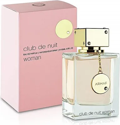 A perfume bottle and its box are displayed on a white background.