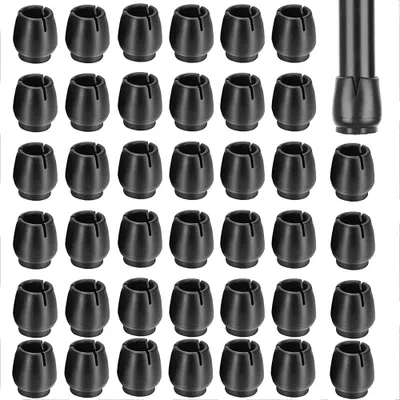 A collection of black chair leg caps.